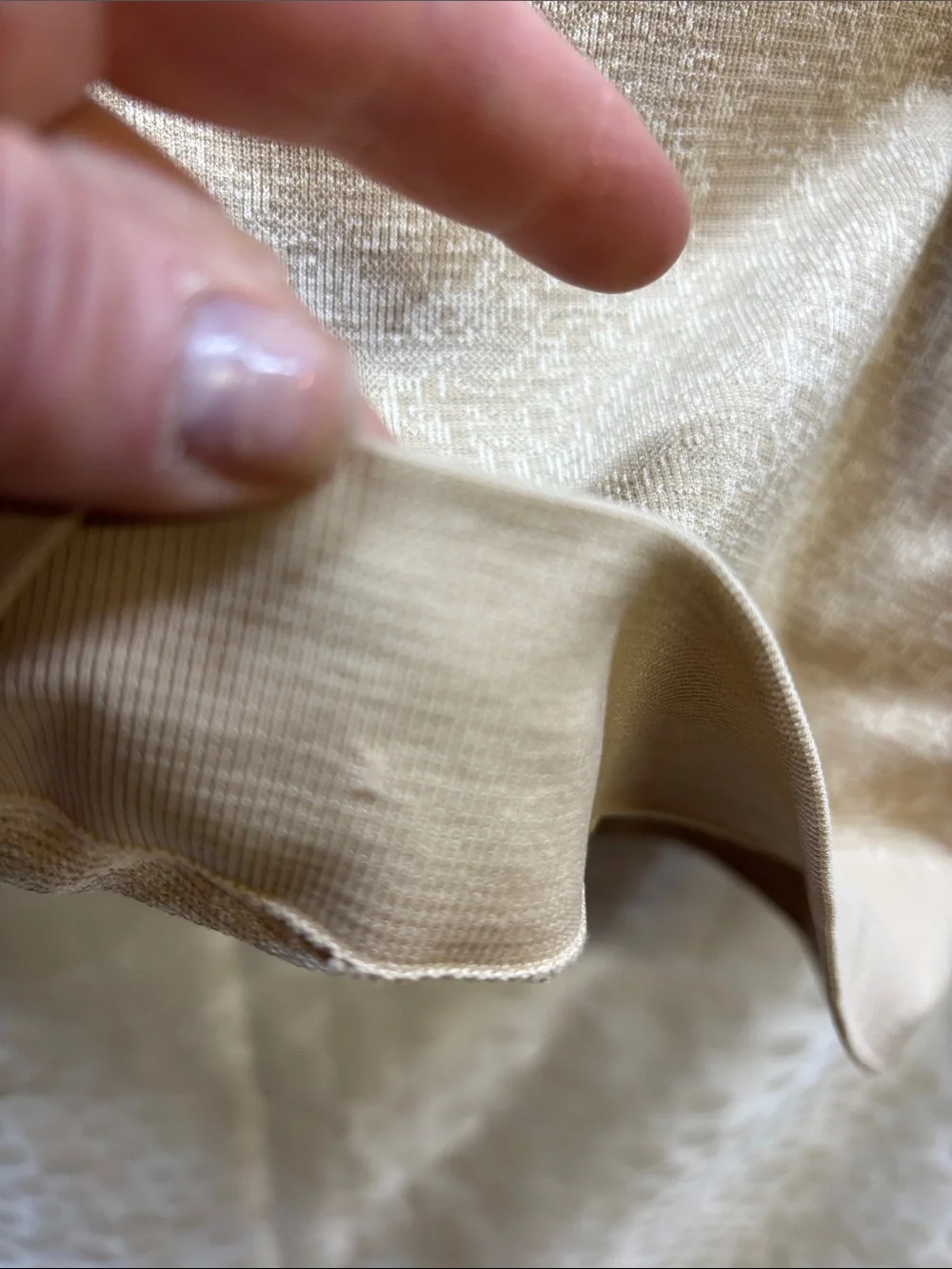 Lululemon Swiftly Breathe Muscle Tank in a metallic beige - size 4